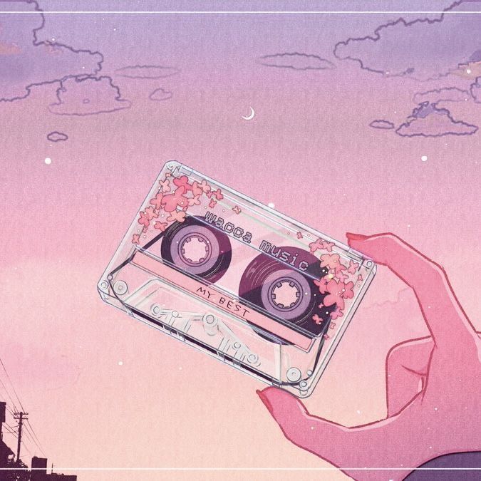 Cassette tape held against a pastel twilight sky